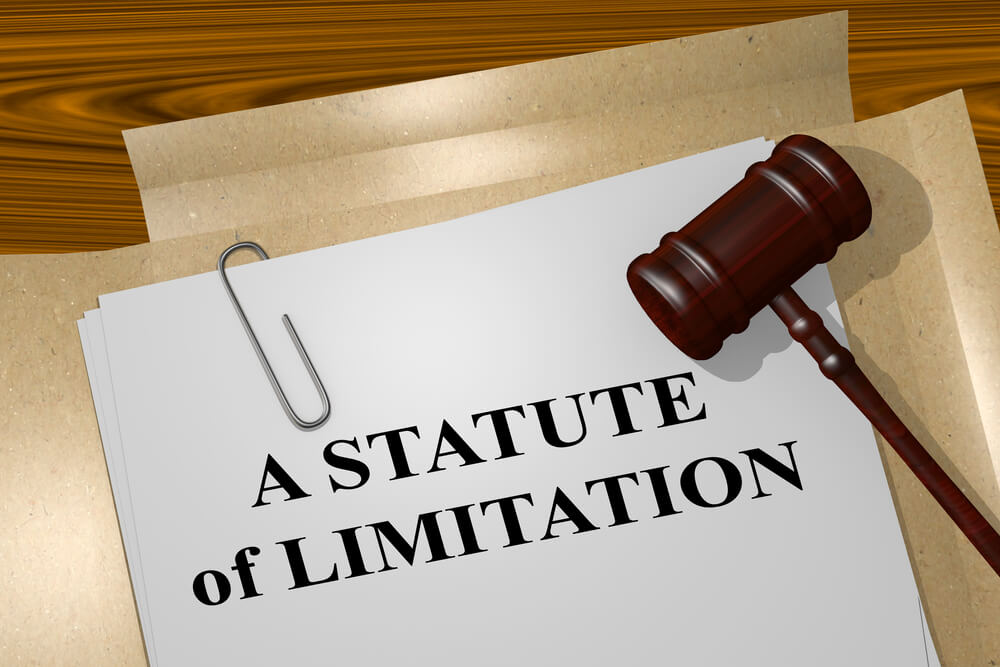 Imagine an illustration featuring a collection of legal papers, with one document bearing the title "Statute of Limitations" prominently at the top.