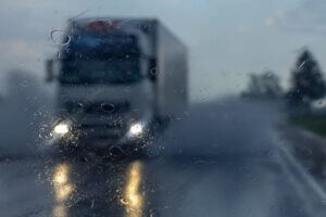 Truck on road in a rainy weather