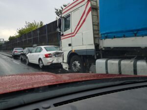 A truck rear-ended with car