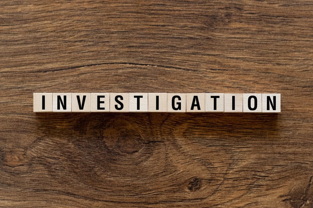 Invetigation - word concept on building blocks, text, letters