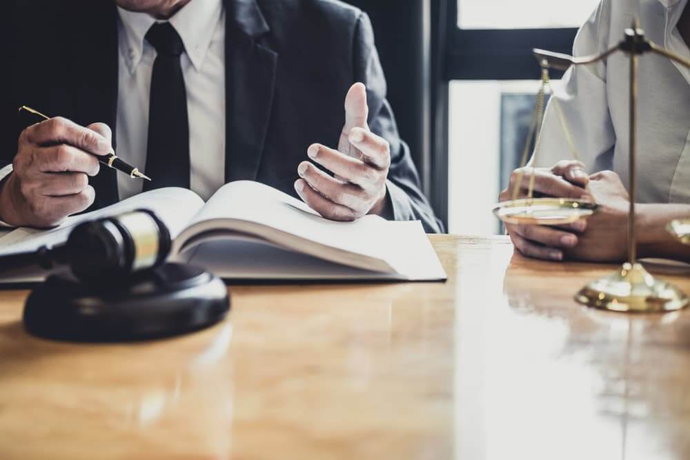 A lawyer is meeting with client